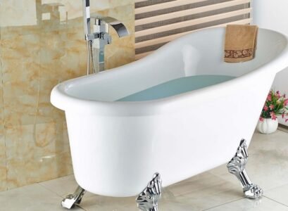 Floor-mount-bathroom-faucet-free-standing-clawfoot-bath-tub-tile-flooring