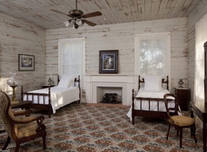 Shiplap-wall-ideas-farmhouse-bedroom-fireplace-floral-pattern-carpet