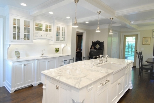 calacatta marble kitchen countertops white cabinets pendant lights