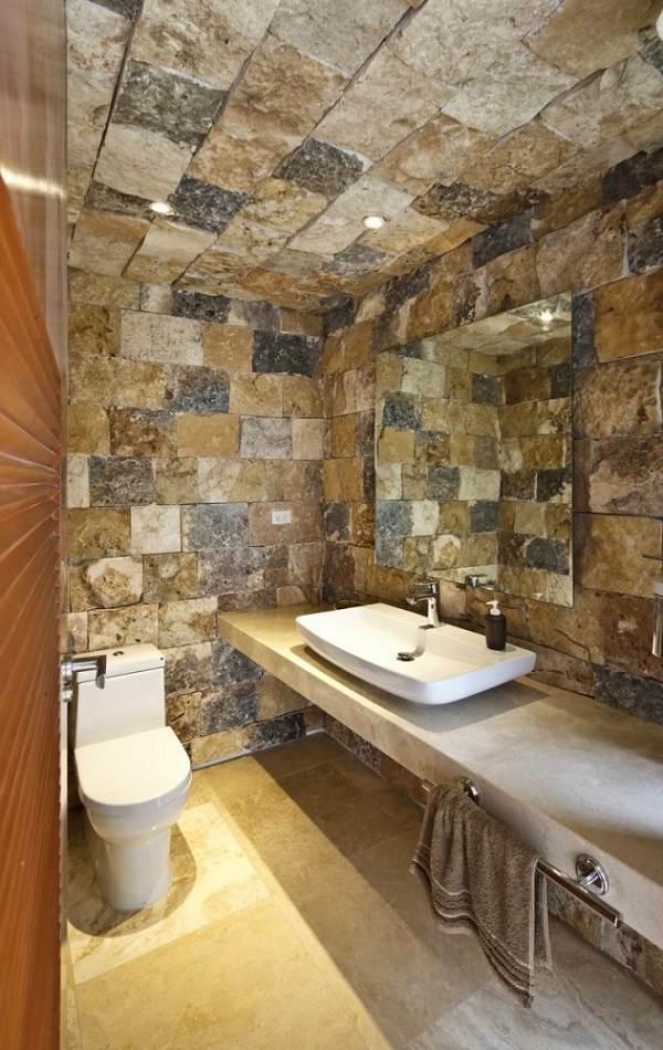 creative bathroom ideas stone wall stone ceiling large mirror