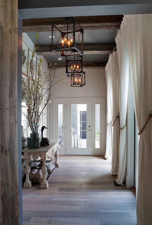 house entry hall faux beams lanterns mediterranean style