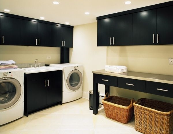 laundry-room-furniture-ideas-black cabinets table baskets