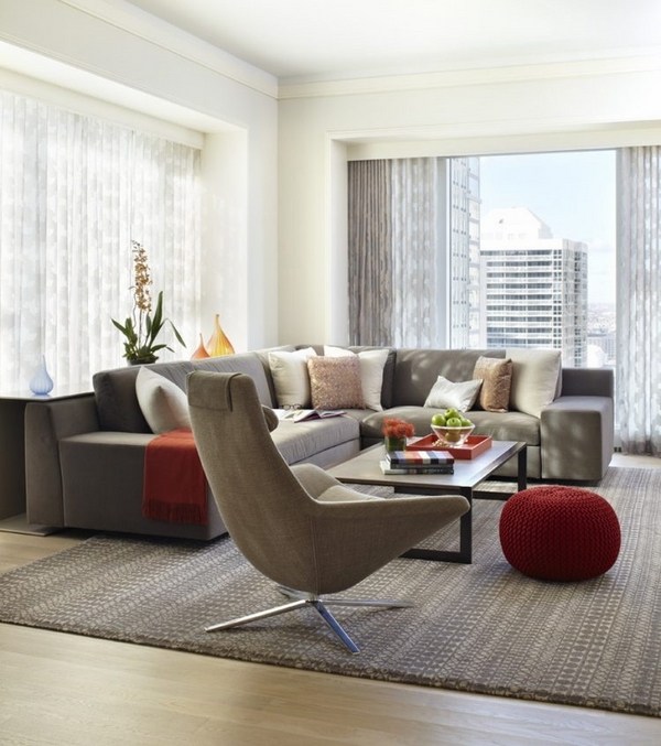 living-room-furniture-ideas-gray-carpet-armchair-red-pouf-red-accents