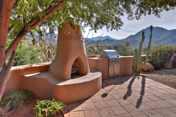 mexican style backyard decor clay fireplace 