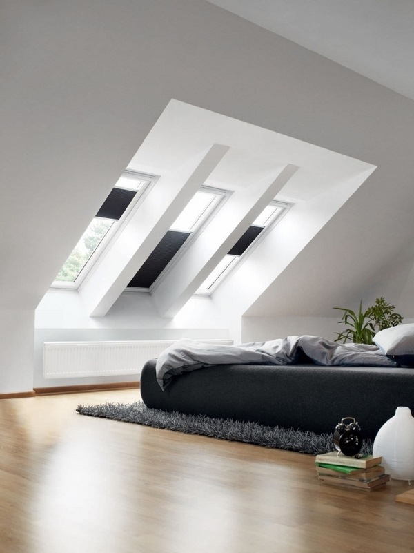 attic remodel modern bedtroom wood floor skylights black blinds