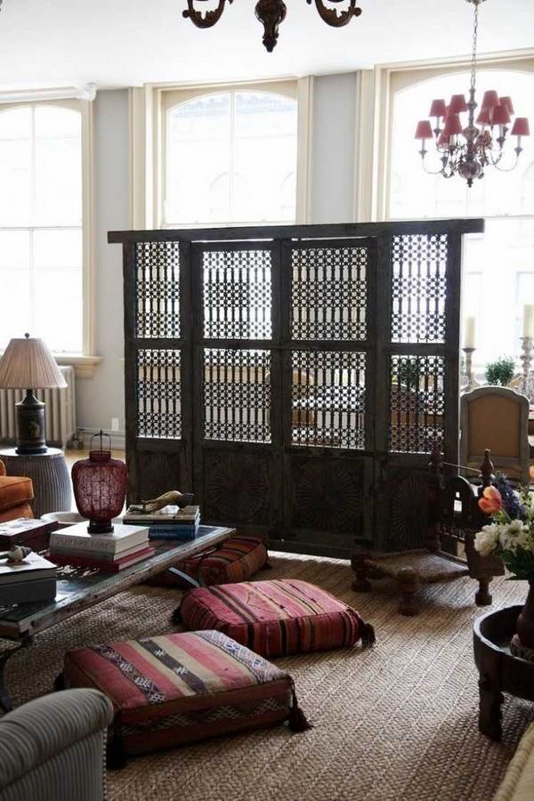 oriental style interior floor cushions carved wood screen 