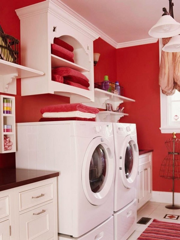 small-laundry-room-ideas-red-wall-color-white-cabinets-area-rug