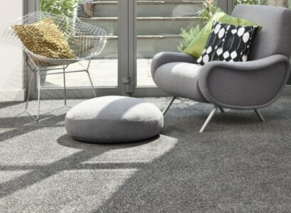 trendy-living-room-ideas-neutral-gray-colors-carpet-floor-cushion-armchair