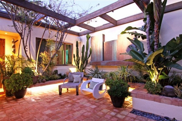 tropical patio decor Saltillo floor tiles outdoor furniture garden lighting ideas