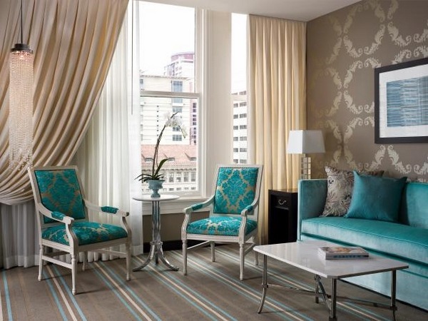 turquoise furniture ideas turquoise sofa armchairs brown wallpaper