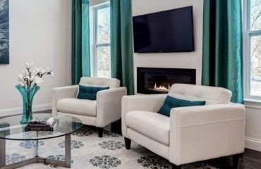 turquoise-living-room-curtains-round-glass-top-coffee-table-white-living-room-furniture-armchairs