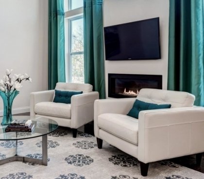 turquoise-living-room-curtains-round-glass-top-coffee-table-white-living-room-furniture-armchairs