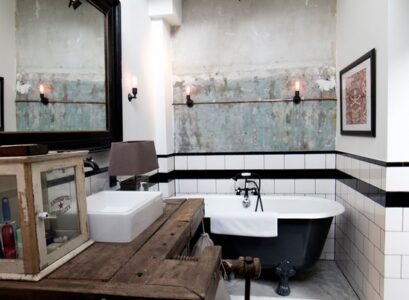 vintage-industrial-bathroom-decor-ideas-clawfoot-tub-wood-vanity-counter