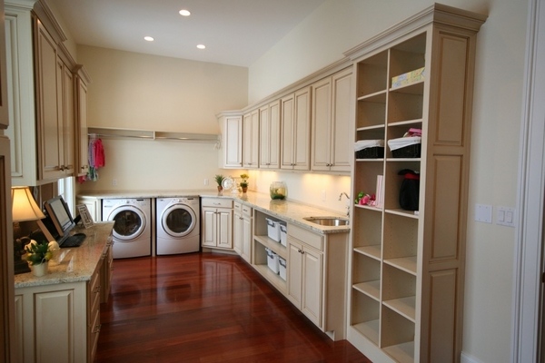 white-wall-mounted-laundry-room-cabinets-built-in-washer dryer marble countertop 