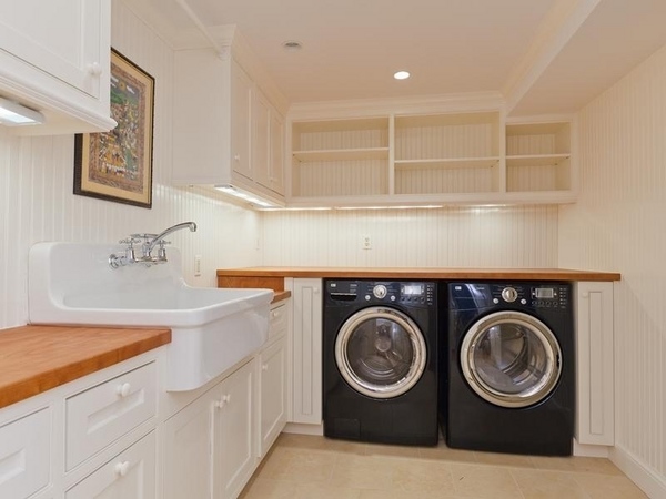 basement-laundry-room-ideas-white-cabinets-farmhouse-sink-wood-countertop