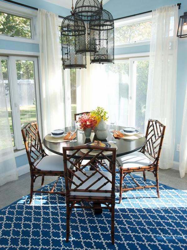 breakfast nook blue carpet bamboo chairs birdcage chandeliers