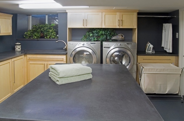 contemporary-Basement-laundry-room-ideas-gray wall color wood cabinets