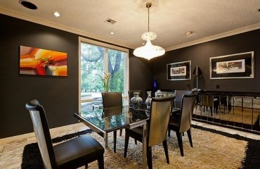 contemporary-dining-room-black-wall-color-beige-carpet-mirrored-sideboard