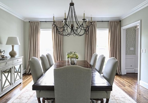 dining-room-design-gray-dining-chairs-mirrored-sideboard-black-beaded-chandelier