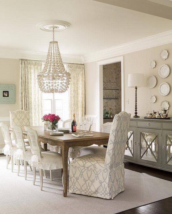 elegant-dining-room-design-wood-table-white-chairs-mirrored-sideboard 