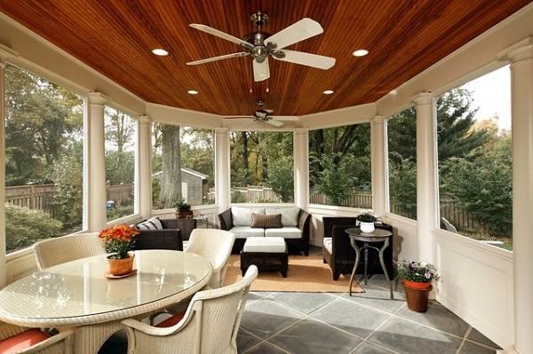 sunroom-addition design area rug white dining furniture seating area 