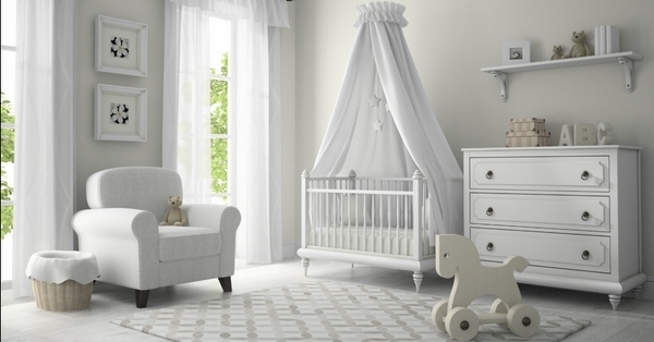 white-nursery-room-wooden-cot-chest-of-drawers-armchair