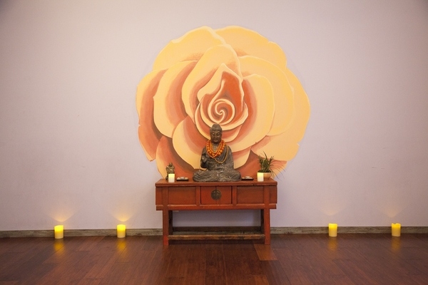 Yoga studio decorating ideas wall art budha statue candles