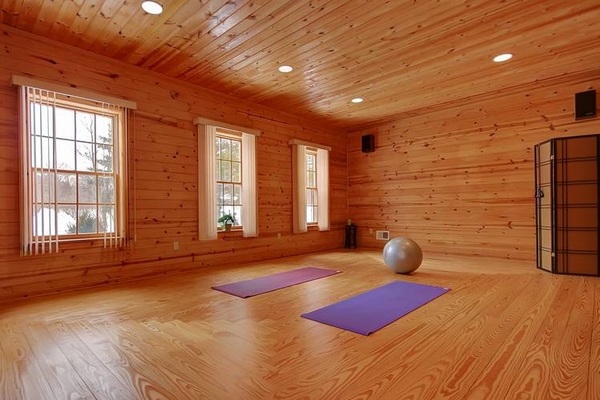 Yoga room design ideas wood flooring wall wood ceiling