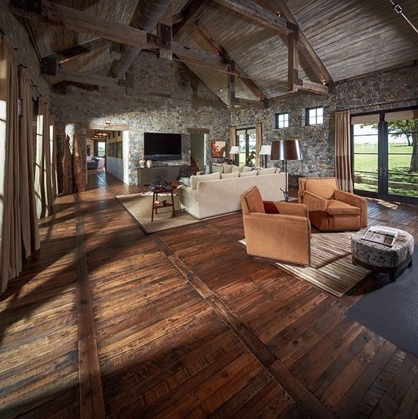 rustic living room decor reclaimed wood flooring stone walls