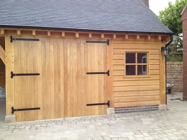 wooden garage oak garage doors front yard landscape