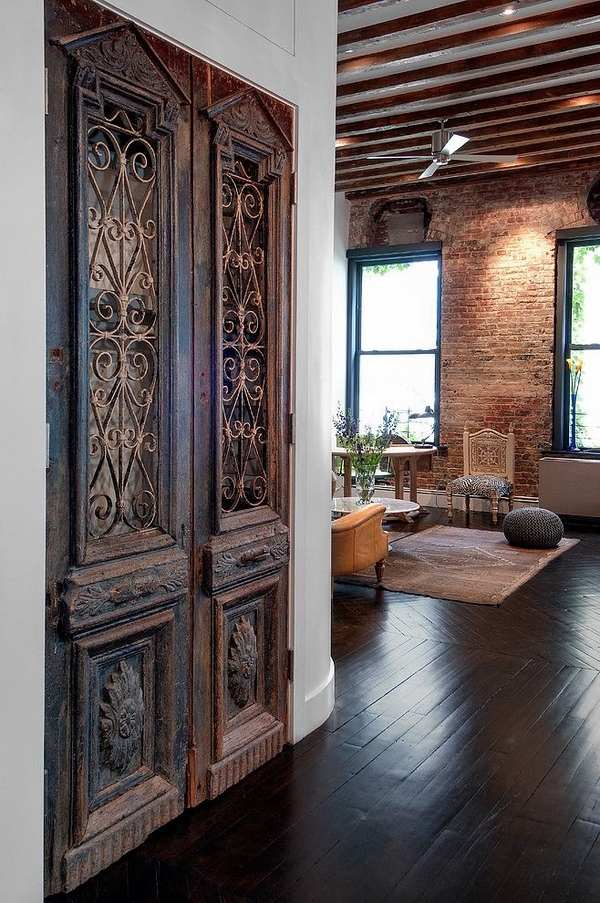 Antique doors in the interior loft apartment design brick wall 