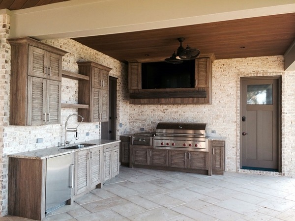 Outdoor kitchen tv cabinet bar area 