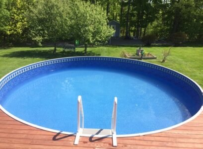 radiant-pools-ideas-round-pool-wooden-pool-deck-garden-pool-design