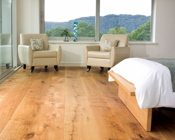 wide plank flooring ideas modern bedroom design armchairs