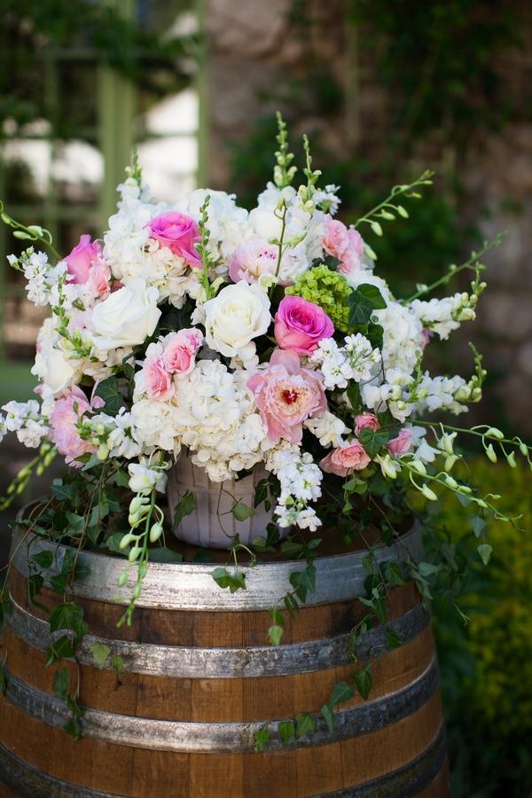 wine barrel furniture ideas floral centerpiece roses wedding decor