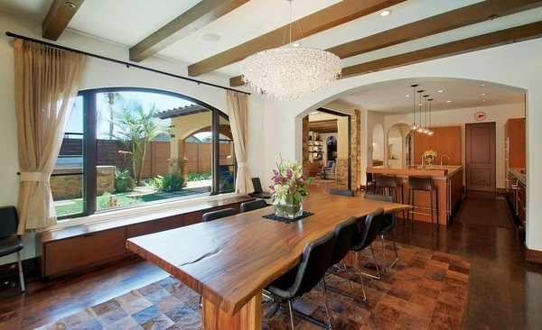 wood-slab-dining-table-designs-leather chairs ceiling beams 