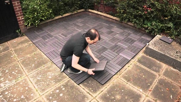 laying outdoor tiles