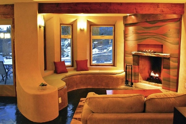 cob living room with fireplace