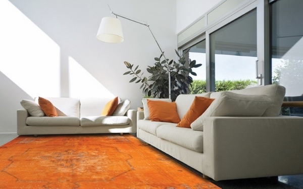 living room design gray sofa set orange pillows