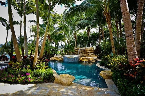 Tropical pool and greenery-tropical-pools-landscaping ideas pool water features