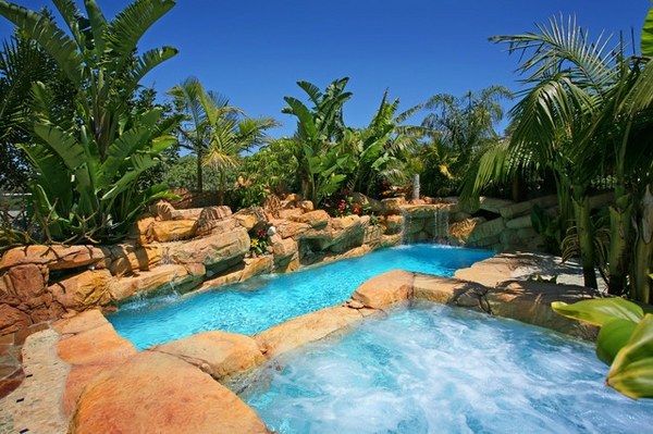 tropical-pools-landscaping ideas pool decorating ideas palm trees rocks