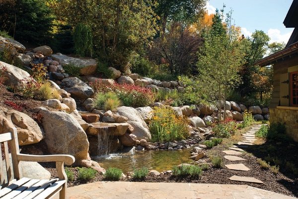 Boulder retaining wall design ideas garden water feature 