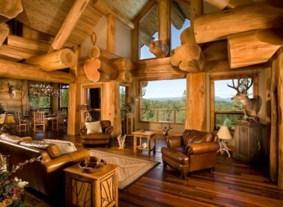 Log-cabin-interiors-living-room-decorating-ideas-leather-armchairs-side-tables