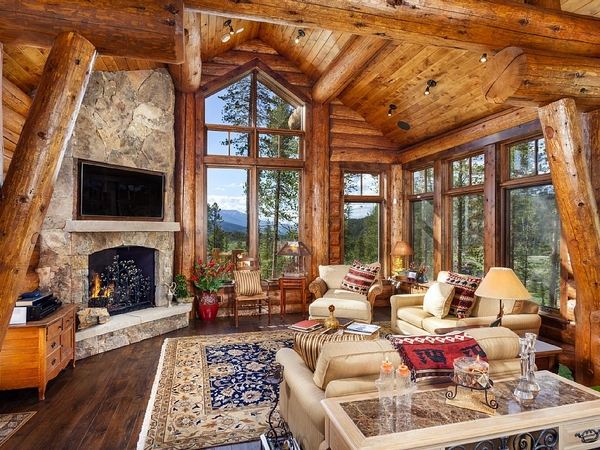 log-cabin-decor-ideas-living room ideas stone fireplace sofa 
