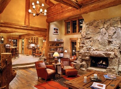log-cabin-decorating-ideas-stone-fireplace-wood-coffee-table-area-rug