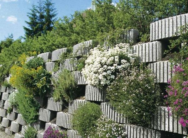 retaining wall ideas cinder block wall blooming flowers