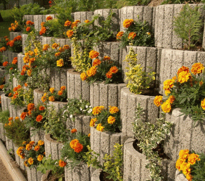 retaining-wall-ideas-planter-boxes-concrete-planters-blooming-flowers