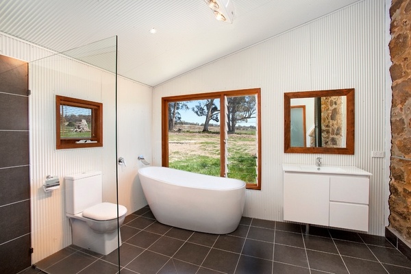 corrugated metal wall bathroom design freestanding tub