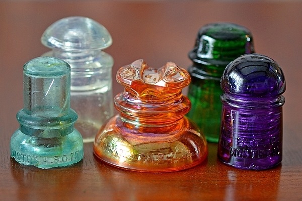 paper weight upcycling ideas with glass insulators