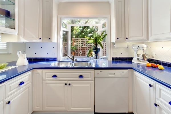 white kitchen cabinets blue countertop